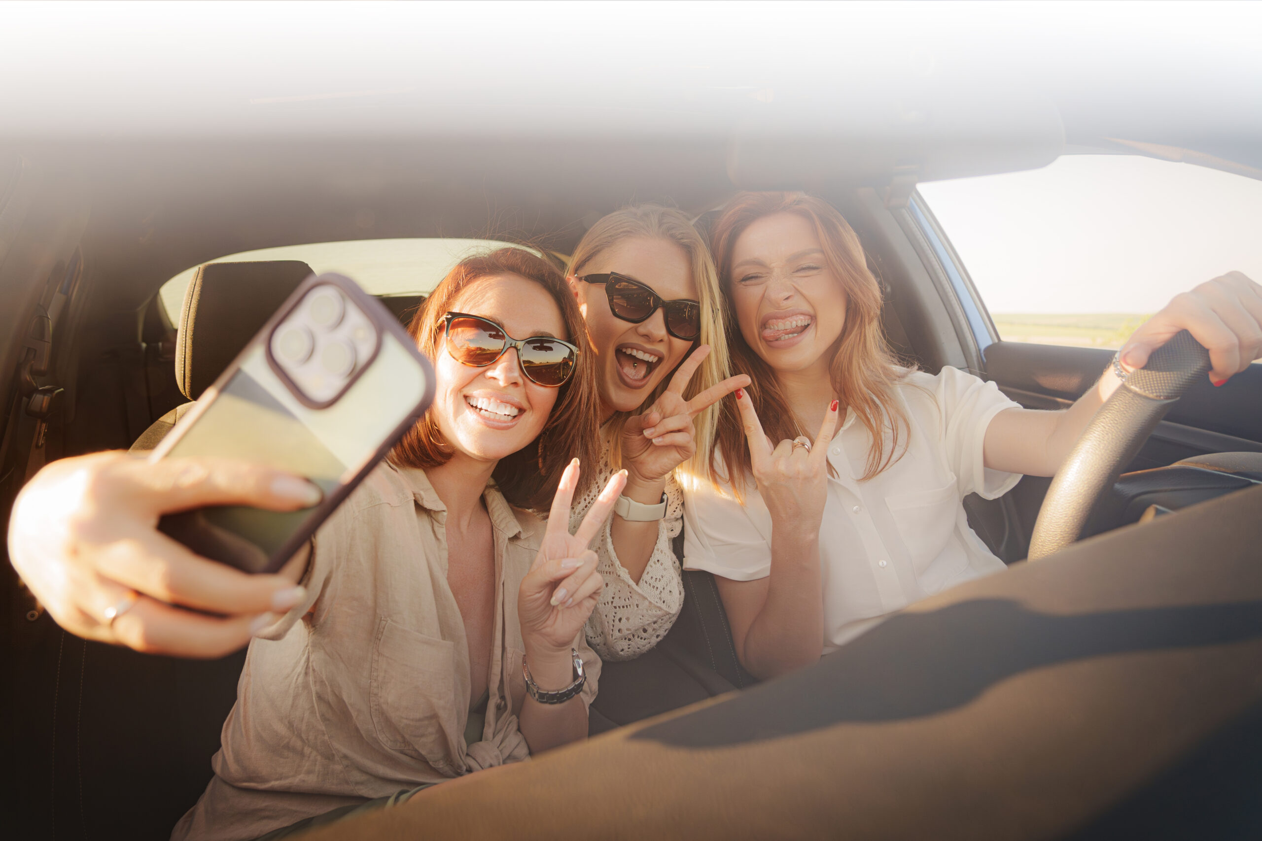 Happy,Young,Women,In,Casual,Clothes,With,Stylish,Eyeglasses,Sitting